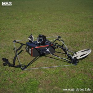 Ger Detect Treasure Way metal detector with control panel and search coil for detecting buried metal objects.
