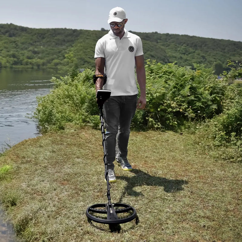 UIG Gold Digger Metal Detector with control panel and search coil for gold prospecting and treasure hunting.