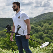 UIG Gold Digger Metal Detector with control panel and search coil for gold hunting and treasure detection.