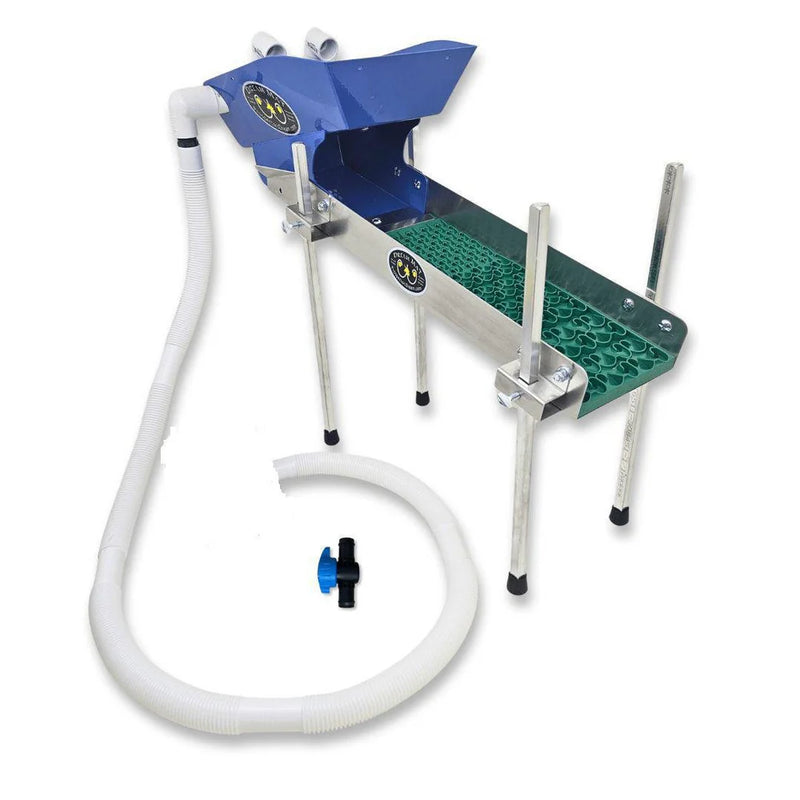 Prospector Dream 6x24 Highbanker sluice box with Dream Mat for gold mining, featuring legs and a pump, outdoor mining setup