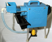 Camel Mining Mountain Goat Trommel used for gold prospecting, shown with its rotating drum and sluice box setup.