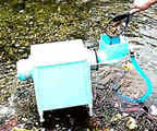Camel Mining Mountain Goat Trommel used for placer gold recovery, featuring a compact design with rotating drum for efficient screening.