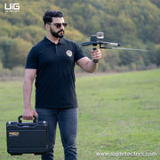 UIG Gold Hunter smart device for detecting gold, metals, diamonds, and cavities, shown with metallic and diamond components.