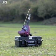 UIG Titan 500 smart device for detecting gold, metals, gemstones, and diamonds, with a sleek gold design and metal accents.