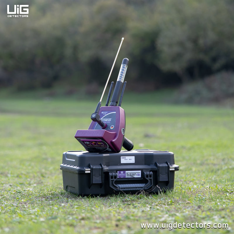 UIG Titan 500 smart device for detecting gold, metals, gemstones, and diamonds, with a sleek gold design and metal accents.