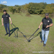 UIG Treasure Way Detector handheld metal detector with control panel and search coil for treasure hunting and metal detection.